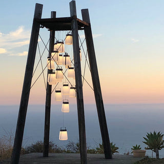 cluster of bump lantern lighting up outdoor by the sea